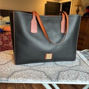 Dooney & Bourke Black Pebbled Tote with Brown Trim and Handles